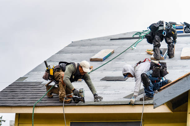 Professional Gutter Installation technician working in Hubbardston, MA